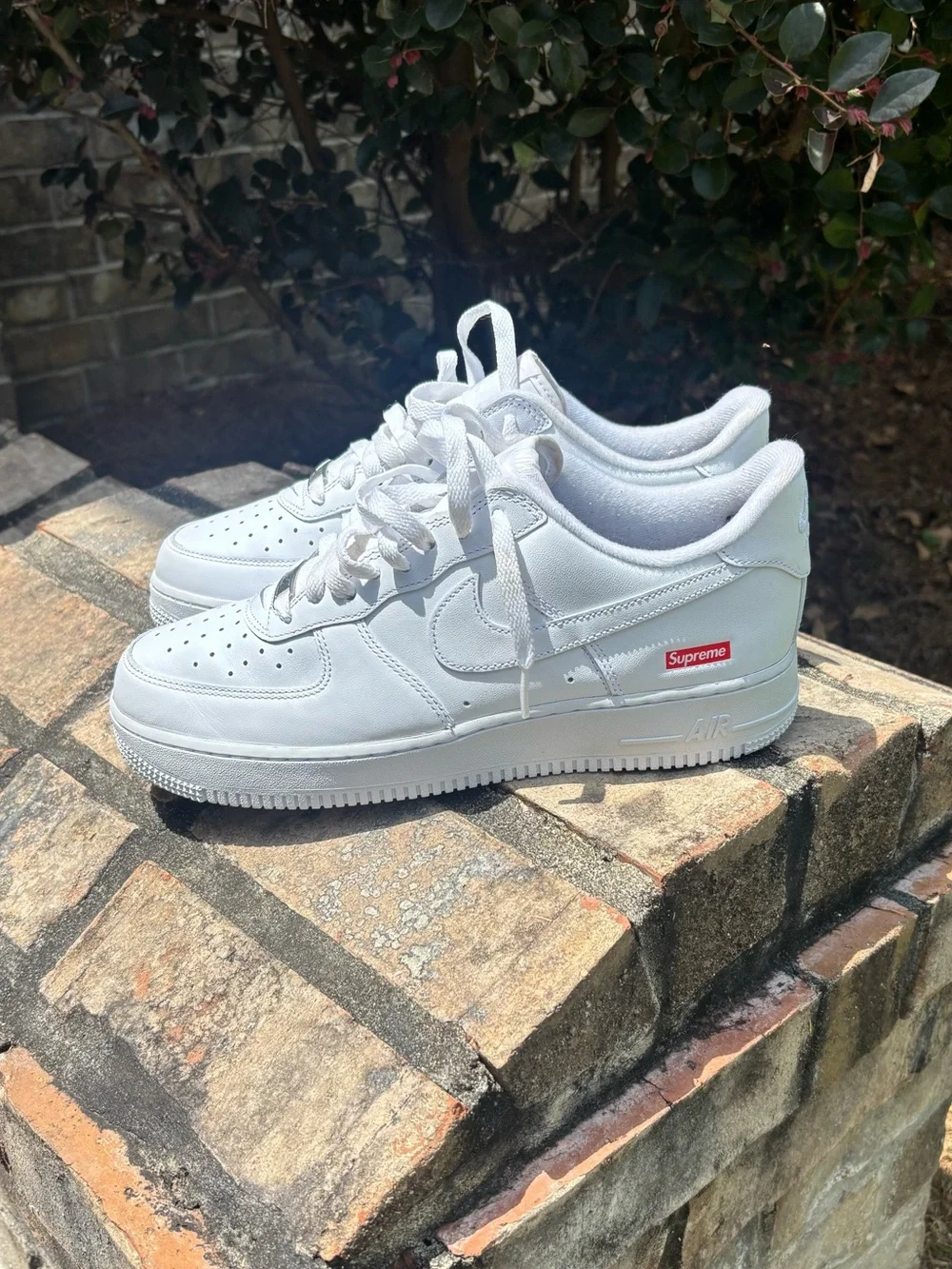 Nike White Low-Top Leather Sneaker with Red Supreme Box Logo